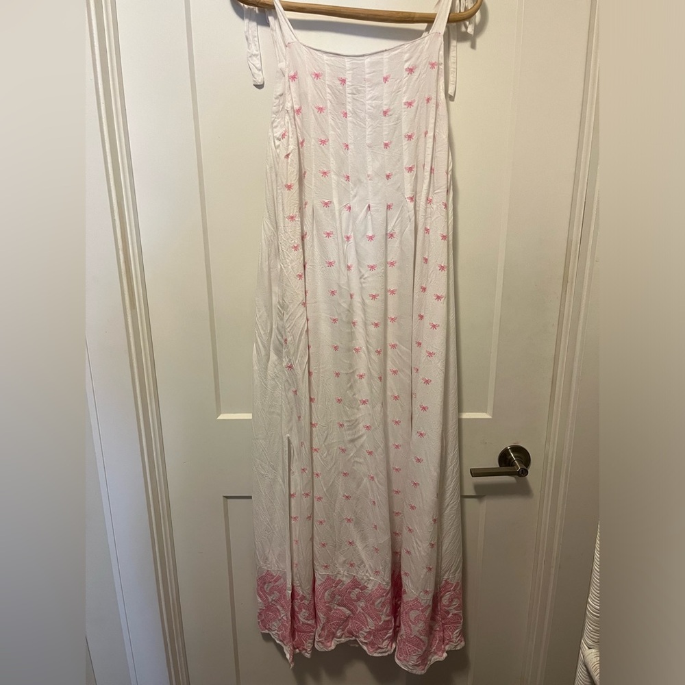 The yellow hanger white and pink embroidered dress